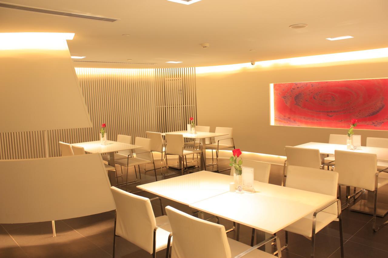Magnolia Business Hotel Xining Railway Station Grand Cross Mojia Street Extérieur photo